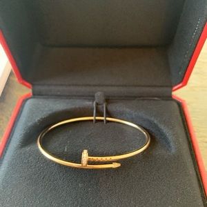 Cartier justne clou bracelet rose gold with diamonds.